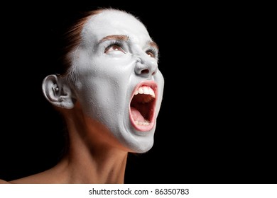 Mime Girl Looks Up And Screams. Closeup.