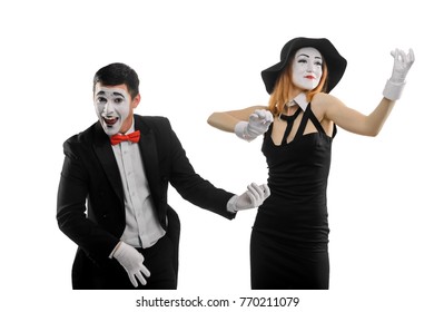 Mimes Playing Imaginary Music Instruments. Male And Female Artists Performing A Pantomime, Acting Without Words. Dumb Show, Jazz Concert Concept.