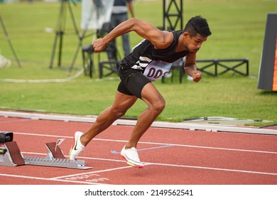 MIMIKA, PAPUA, INDONESIA - October 12, 2021: Indonesian athletic athletes in the men's 400-meter run prepare on the athletic track to start the national championship.