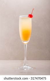 Mimosa Cocktail Isolated On Grey Background