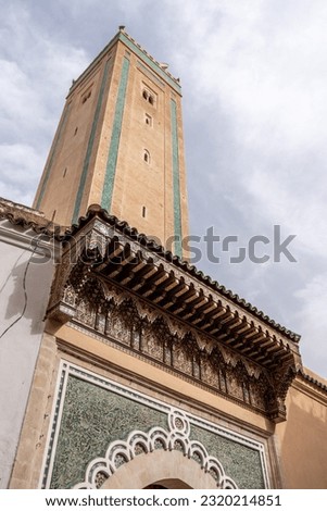 Minaret of the olf R'Cif mosque in the medina of Fes, Morocco