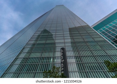 Minato Ward, Tokyo, Japan - August 19, 2018 : Street Level View Of Dentsu Headquarters Building Designed By French Architect Jean Nouvel