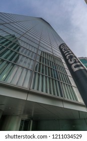 Minato Ward, Tokyo, Japan - August 19, 2018 : Street Level View Of Dentsu Headquarters Building Designed By French Architect Jean Nouvel