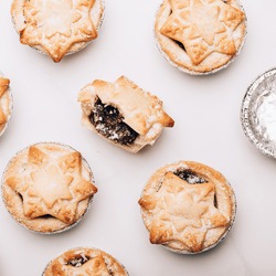 Mince Pies, Traditional Christmas Food From All Butter Shortcrust Pastry Filled With Cranberries, Sultanas, Currants, Raisins, Along With Festive Spices, Clementine Juice, Dash Of Brandy And Cognac