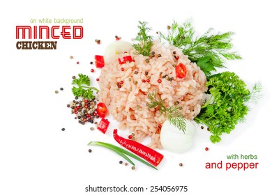 Minced Chicken Meat On A White Background With Herbs And Pepper