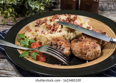 Minced Meat Cutlets With Boiled Sauerkraut  On Wooden Table.