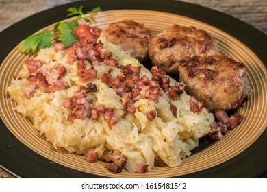 Minced Meat Cutlets With Boiled Sauerkraut  On Wooden Table.