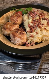 Minced Meat Cutlets With Boiled Sauerkraut  On Wooden Table.