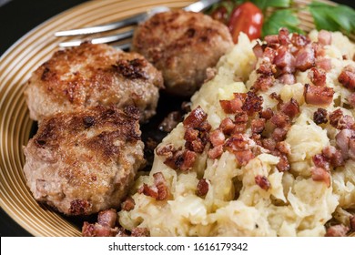 Minced Meat Cutlets With Boiled Sauerkraut  On Wooden Table.