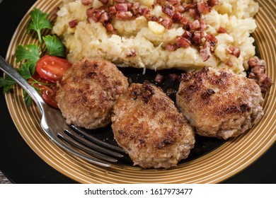 Minced Meat Cutlets With Boiled Sauerkraut  On Wooden Table.