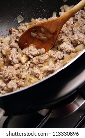 Minced Meat And Onion Being Fried On A Pan