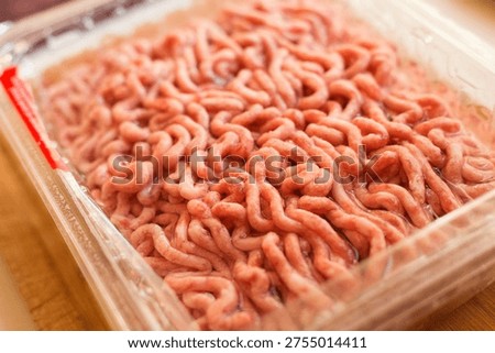 Minced meat in a plastic big container from the supermarket