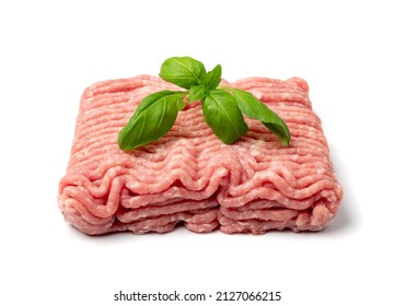 Minced pork meat isolated. Ground fresh fillet, uncooked pig mincemeat, raw forcemeat, farce minced meat portion with greens on white background