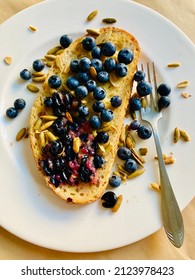 Mindful Food Choices Reward Us With Good Health. Try Toasted Cracked Wheat Sourdough Bread With Vegan Butter And Fresh Organic Blueberries Topped With Roasted Pumpkin Seeds For A Health Boost!