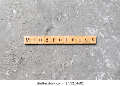 mindfulness word written on wood block. mindfulness text on table, concept. - Shutterstock ID 1772134601