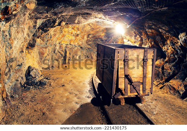 Mine gold underground\
tunnel railroad
