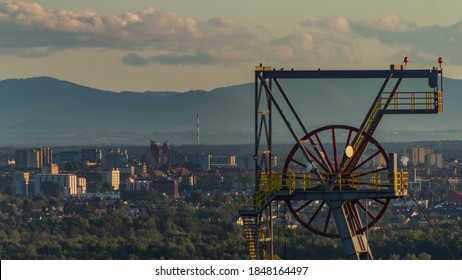 Mine hoist tower against the background of the Silesian Beskids mountains