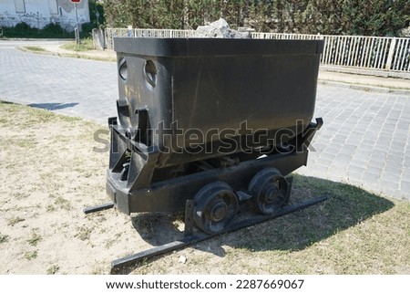 A minecart with limestone stands in Ruedersdorf near Berlin, Germany. A minecart, mine cart, a mine trolley or mine hutch is a type of rolling stock found on a mine railway.