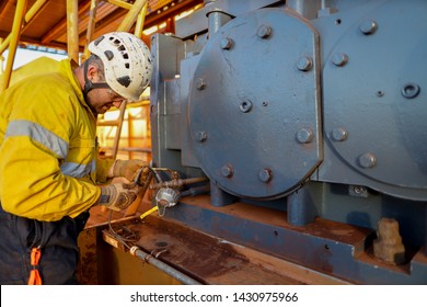 Miner Electrician Worker Conducting Safety Inspection On Wire Cable Power Generator On The Construction Mine Site Plant, Sydney, Australia 