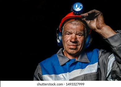 Miner Happy Man Smiling After Working On Coal Mine. Concept Industrial Engineer.