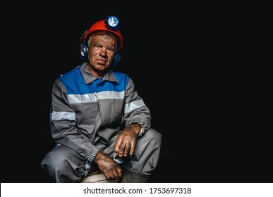 Miner Happy Man Smiling After Working On Coal Mine. Concept Industrial Engineer.