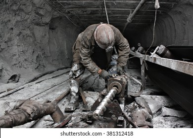 miner in a mine - Shutterstock ID 381312418