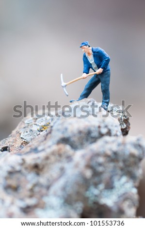 Miner with pickaxe