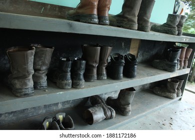 Miner Shoes Arranged On A Shoe Rack