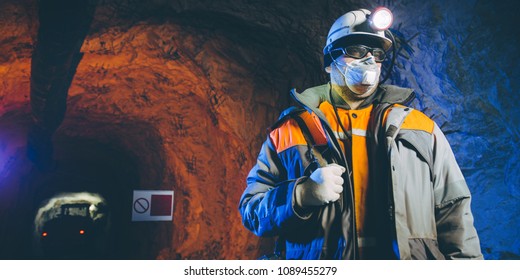 miner underground mining gold - Shutterstock ID 1089455279