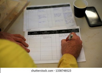 Miner Worker Writing Safe Risk Assessment A Job Safety Analysis (JSA) Prior Performing High Risk Task At Construction Mine Site Perth, Australia    