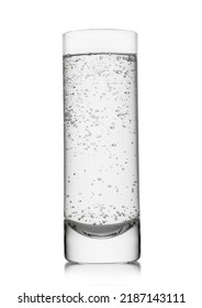 Mineral Sparkling Water With Bubbles In Highball Glass On White.