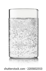 Mineral Sparkling Water With Bubbles In Highball Glass On White Background.