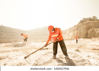 Miners Working With Mining Tool In Dusty And Baking Hot, Mining And Summer Hot Sun In The Backgrounds. Hard Work Concept. Noise, Grain.