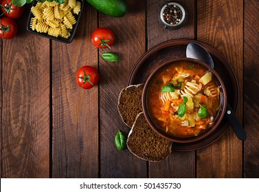 Minestrone, Italian Vegetable Soup With Pasta On Wooden Table. Top View