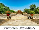 Minh Mang tomb near the Imperial City with the Purple Forbidden City within the Citadel in Hue, Vietnam. Imperial Royal Palace of Nguyen dynasty in Hue. Hue is a popular