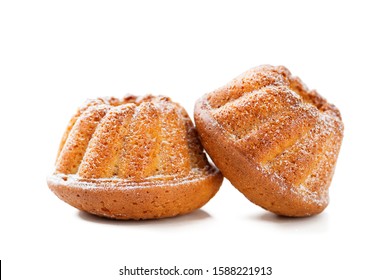 Mini bundt cakes or muffins with icing sugar isolated on white background. - Powered by Shutterstock