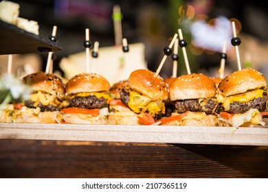 Mini Burgers Plate On Wooden Table