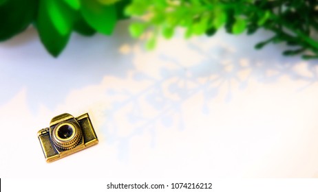 mini camera on white background with copy space