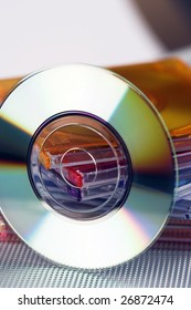 mini cd over stack of color cd boxes