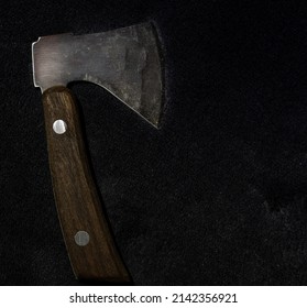 Mini Cheese Wooden Hatchet Isolated On Black Background