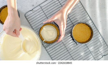 Mini cheesecake recipe. Pouring cheesecake batter into a prepared baking pan, close-up preparation process, flat lay