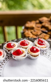 Mini Cherry Cheesecake Cups On Dessert Table