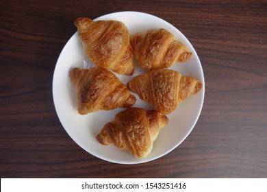 
Mini Croissant On Wooden Table.