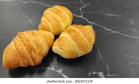 A Mini Delicious Croissant Baked Background