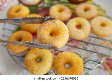 Mini Donut Sugar brown, Fresh donuts in cooling rack.