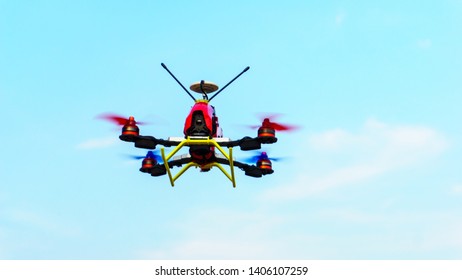 Mini Drone Quad copter on sky - Shutterstock ID 1406107259