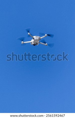a mini drone that weighs less than 250 grams flying