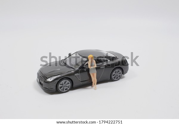 Mini of\
figure photo the model with car. Dress,\
face.