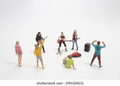 a mini figure of singer on the board - Shutterstock ID 1995104231