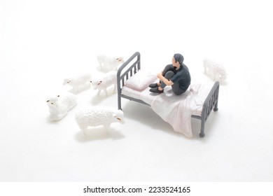 the mini figure, the Sleepless counting sheep